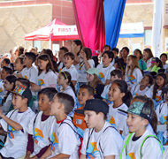 Image of children watching a Festival activity.
