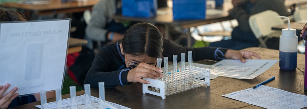 Girl doing experiment