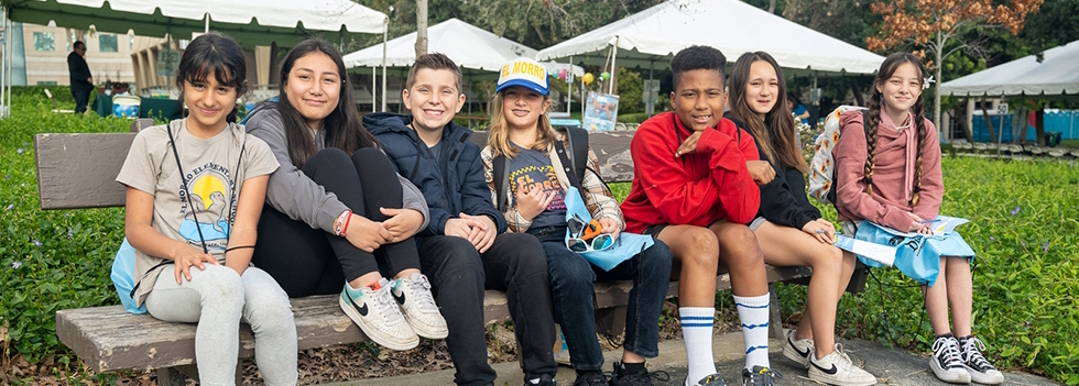 Children sitting on a bench